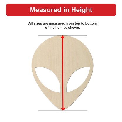 a wooden alien head with a red line extending from the top to the bottom of the head.